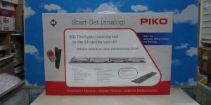 PIKO 97931 HO 1:87 Analog Starter Set Electric Locomotive Taurus + 3 IC Cars PKP Ep VI A-Track with Railbed 158 x 88 cm