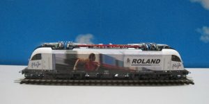 PIKO 59911 HO 1:87 Electric Locomotive Rh1216 Taurus 'WLC Roland' Ep VI 225mm